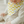 Load image into Gallery viewer, Baby wearing a yellow and white zigzag patterned bib
